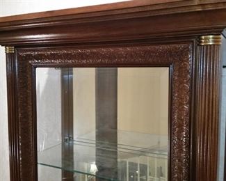 A close look at the mahogany curio cabinet