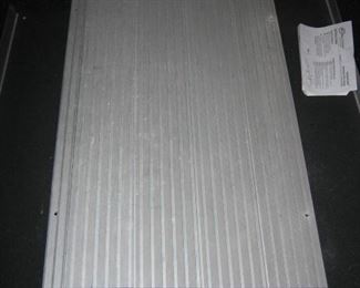 Wheelchair threshold ramp