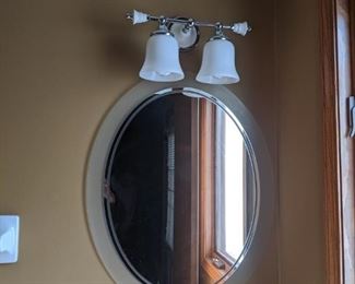 mirror and light fixture