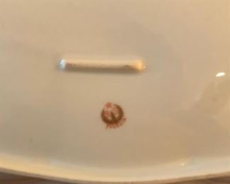Marking on back of celery dish.