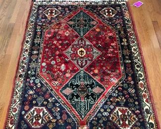 Hand knotted wool rug. Professionally cleaned.