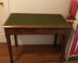 Antique desk with felt top.