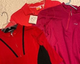 Ladies' golf wear galore--mostly size M. Adidas, Puma, Nike, DKNY, and more
