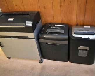 Paper shredders (middle one pulled)