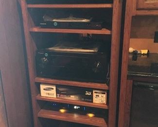 DVD player, Pioneer receiver, media equipment; undercounter refrigerator