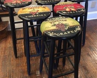 Six hand-painted bar stools 