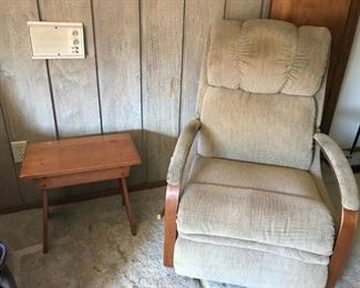 Tan gliding recliner and small vintage side table