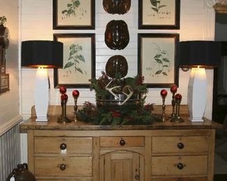 Antique Pine server from France decorated for the holidays with deer antlers, pine cones, greens and berries.