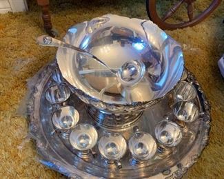 #55		Silverplate Punch Bowl w/Ladle w/Underplate & 15 silverplate Cups 	 $75.00 
