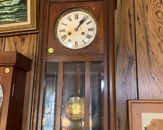 #89 Wall clock Wood w/Wood Slats on Glass-front 13x7x31 $150.00