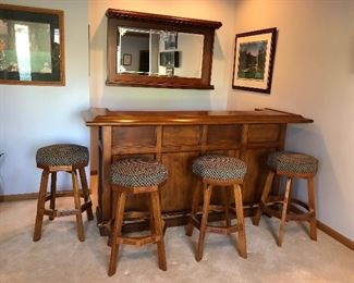 Buy it now : $1,800 no reductions. Home Bar with Bar Back Mirror and 4 Swivel Stools by Mikhail Darafeev designs.
Known to be the world’s finest, each piece is expertly constructed in their own immaculate factories. Darafeev products are entirely American made. For over 50 years, Mikhail Darafeev has designed and manufactured custom-made. All are made of genuine hardwoods and equally high-grade materials. 7 foot long