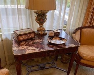 Louis XVI style table, with marble top and gilt brass mounts, circa 1900.