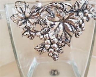 Coin Jar? Vase? Candy Dish? Fork Holder? I don't care what you do with it, it's yours now. Its not like you're going to invite me over for dinner and I'll see it. Which BTW, why do none of our customers invite Nancy and I to dinner? We are FUN!. Well, as long as there is wine we are. Other than that we are kinda duds.