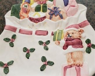 Plate. Why does it look like the bear is bleeding out of his feet? Poor guy. Bears gone Wild.