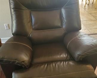 Leather Recliner. I took several naps in this thing, but tell the owners.