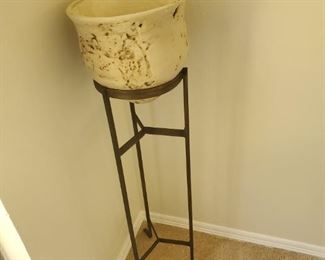 Pot on a stand. Confucius say "Man who stands on toilet is high on pot". I know this to be a fact, because I met him in person.