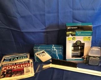 Two Rain Ponchos, Tarp, Ice Scraper, Weather Alert Radio, Digital Camera, Binoculars, Lantern Radio