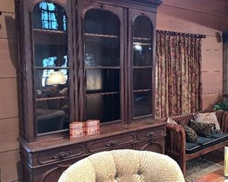 Large antique breakfront with writing desk.