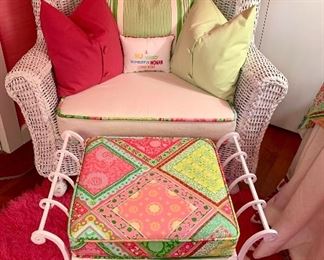 White wicker with painted iron foot rest! Custom pillows!