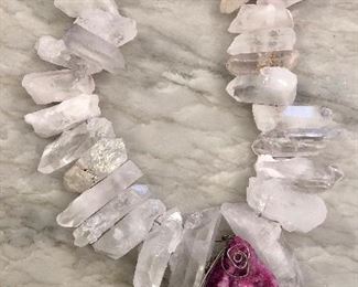 Giant Pink Geode on crystal quartz chain