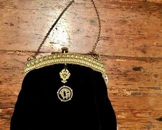 Black velvet evening purse, France 1920s with onyx and pearl medallion on gold-tone hardware. Formerly the provenance of MET.