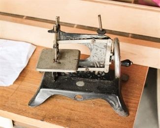 Small metal sewing machine.