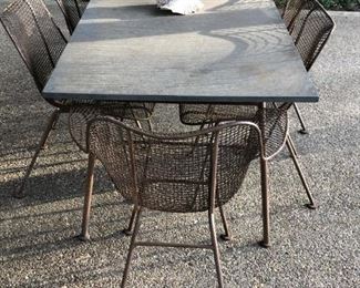 Iron & Slate Top Table with Six Original Woodard Chairs..