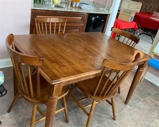 #2		dining table with 4 chairs built in 12" leaf 54x36x29.5	 $225.00 
