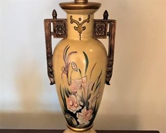 One of a pair of floral painted ceramic table lamps