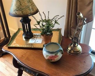 Small accent table, brass desk lamp, marked Hull pottery bowl, decorative wooden tray, shaded desk lamp