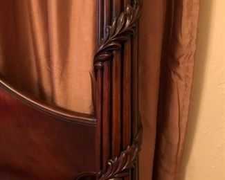 Detail on bed posts for mahogany king-size, four poster bed