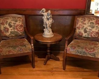 Pair of Upholstered fauteuil chair, small round table, statue