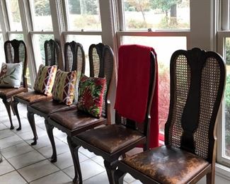 Six leather seat dining chairs, decorative pillows, throw