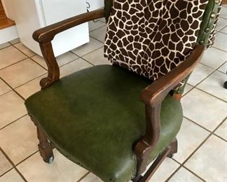 Leather-covered arm chair