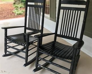 Pair of black wooden porch rockers