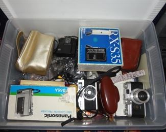 Vintage cameras by Kodak, Cannon and Panasonic.