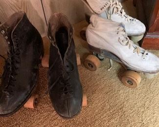 Men’s and women’s vintage wooden wheel roller skates.