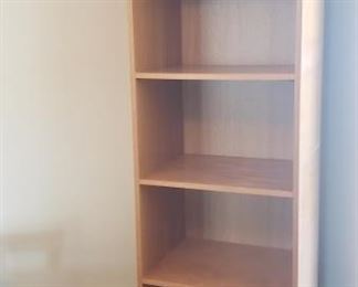 Tall slender shelving unit