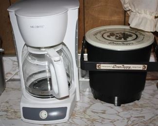 All of the kitchen items are in like new condition including this coffee maker and deep fryer