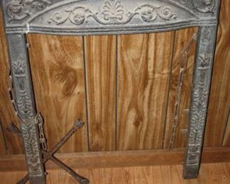 Antique cast iron fireplace surround