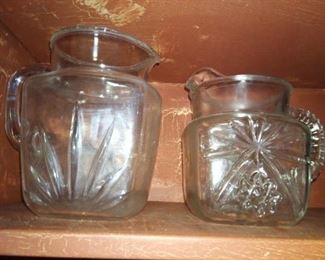 Pressed glass pitchers