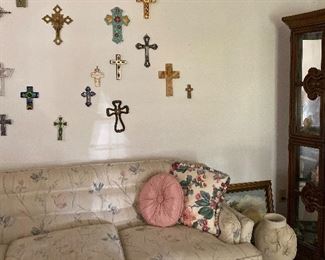 Sofa, Throw Pillows, End Table, Lamp, Assorted Crosses and Crucifixes, Curio Cabinet