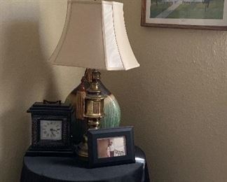 Round Corner Table, Lamp, Assorted Mantel Clocks, Signed Print by Richard Lewis Centennial House Corpus Christi