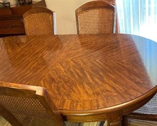 Broyhill Dining Table with Five Cane Back Chairs and one Captain's Chair