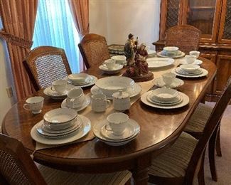 Broyhill Dining Table with Five Cane Back Chairs and one Captain's Chair, Broyhill China/Hutch Cabinet, Holy Family Centerpiece, China