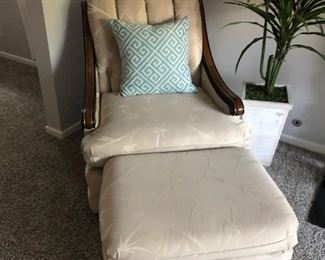Living room chair and ottoman. Does not include pillow or plant.