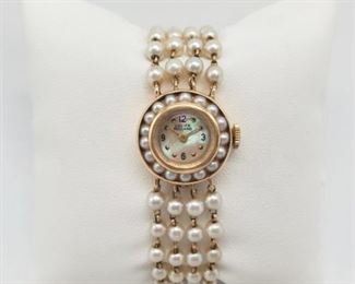 Lot 001
Vintage Lucien Picard 14K Gold/Pearl Watch