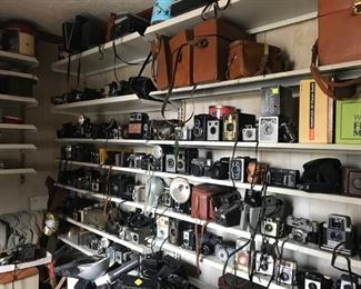 100's of old camera's, some have boxes with them