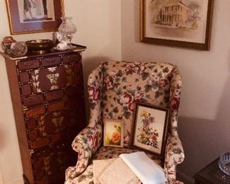 Comfortable wingback with Queen Anne legs. Oriental chest that breaks into three pieces