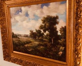 Oil painting in an ornate gold leaf frame